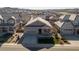 Aerial view of the home showcasing its location within a residential neighborhood and well-maintained landscaping at 8048 Grady Cir, Castle Rock, CO 80108