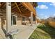 Backyard patio with lush green grass, providing a serene outdoor living area at 8048 Grady Cir, Castle Rock, CO 80108