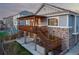Multi-level deck overlooking the backyard, providing ample space for relaxation and enjoyment at 8048 Grady Cir, Castle Rock, CO 80108