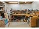 Basement with a wooden workbench, providing a dedicated space for various projects and storage at 8048 Grady Cir, Castle Rock, CO 80108