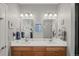 Bathroom with double vanity, modern fixtures, and ample lighting at 8048 Grady Cir, Castle Rock, CO 80108