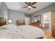 Bedroom with wood floors adjacent to the bathroom at 8048 Grady Cir, Castle Rock, CO 80108