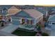 Charming home exterior with a well-manicured lawn and beautiful landscaping, enhancing curb appeal at 8048 Grady Cir, Castle Rock, CO 80108