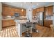 Modern kitchen with granite countertops, stainless steel appliances, and a functional island at 8048 Grady Cir, Castle Rock, CO 80108