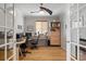 Office space featuring hardwood floors, natural lighting, and modern ceiling fan at 8048 Grady Cir, Castle Rock, CO 80108
