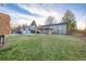 Backyard view showcasing grassy lawn and shed at 3200 S Grape St, Denver, CO 80222