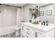 Basement bathroom with double vanity and modern fixtures at 3200 S Grape St, Denver, CO 80222