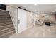 Finished basement with living area and built-in workspace at 3200 S Grape St, Denver, CO 80222