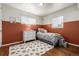 Bright bedroom with hardwood floors and a built-in dresser at 3200 S Grape St, Denver, CO 80222