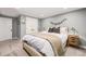 Spacious basement bedroom with double closets and neutral decor at 3200 S Grape St, Denver, CO 80222