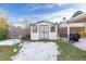 White storage shed in the backyard at 3200 S Grape St, Denver, CO 80222