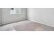 A bedroom with neutral paint and carpeted floors at 1464 Orchard St, Brighton, CO 80601
