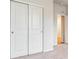 Bedroom with closet and view to ensuite bathroom at 1464 Orchard St, Brighton, CO 80601