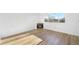 Spacious living room featuring a fireplace, hardwood floors, and plenty of natural light at 2644 Devonshire Ct, Denver, CO 80229