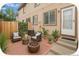Private patio has room for seating and features decorative potted plants at 2644 Devonshire Ct, Denver, CO 80229
