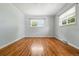 Spacious bedroom with two windows, and hardwood floors at 3608 S Newport Way, Denver, CO 80237