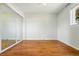Bright bedroom featuring a large closet, and hardwood floors at 3608 S Newport Way, Denver, CO 80237