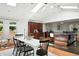 Well-lit kitchen and dining area features skylights and modern furnishings at 3608 S Newport Way, Denver, CO 80237