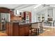 Spacious kitchen with granite countertops and stainless steel appliances at 3608 S Newport Way, Denver, CO 80237