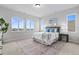 Main bedroom with large windows and plush carpet at 18815 W 93Rd Ave, Arvada, CO 80007