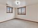 Spacious bedroom with neutral carpeting and window at 1390 E Southern St, Brighton, CO 80601