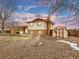 Ranch house with backyard, shed, and stone pathway at 1390 E Southern St, Brighton, CO 80601