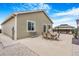 Backyard view featuring a patio with furniture, a metal gazebo, grill, and manicured gravel at 581 Park Blvd, Brighton, CO 80603