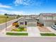 Charming single-Gathering home with manicured front yard, stone accents, and a two-car garage at 581 Park Blvd, Brighton, CO 80603
