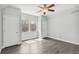Spacious bedroom with lots of natural light and two closets providing ample storage at 8865 E 28Th Ave, Denver, CO 80238