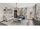 Cozy living room with modern furnishings, area rug, and decor at 8865 E 28Th Ave, Denver, CO 80238