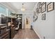 Bright office space with hardwood floors, stylish decor, and a view into a walk-in closet at 8865 E 28Th Ave, Denver, CO 80238