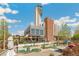 This photo captures the modern Tower Tap and Grill with its outdoor patio and mini golf area at 8865 E 28Th Ave, Denver, CO 80238