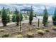 Well-maintained community space featuring a gazebo, walking path, and landscaping, offering a relaxing environment at 14673 E Belleview Dr, Aurora, CO 80015