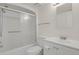 Clean bathroom featuring a shower with sliding glass door and vanity sink at 12625 E Pacific Cir # E, Aurora, CO 80014