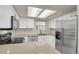 Modern kitchen with stainless steel appliances and ample counter space at 12625 E Pacific Cir # E, Aurora, CO 80014