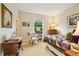 Cozy bedroom with antique decor, comfortable furnishings, and natural lighting at 24422 E Frost Dr, Aurora, CO 80016