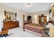 Cozy main bedroom with a large bed, dresser, and lots of natural light at 24422 E Frost Dr, Aurora, CO 80016