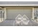 Attached one-car garage providing secure parking and additional storage space at 1920 S Hannibal St # B, Aurora, CO 80013