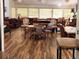 Spacious lounge area with ample seating, wood floors, and abundant natural light at 1920 S Hannibal St # B, Aurora, CO 80013