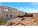 Private backyard featuring low maintenance landscaping, decorative rock, and wooden fencing at 2673 Live Oak Ct, Castle Rock, CO 80104