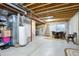 Unfinished basement featuring bare ceiling, a table and chairs and concrete floor at 2673 Live Oak Ct, Castle Rock, CO 80104