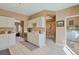 Spacious kitchen featuring stainless steel appliances, white cabinetry, and sleek countertops at 2673 Live Oak Ct, Castle Rock, CO 80104