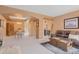 Spacious living area with a dining space, modern decor, and ample natural light at 2673 Live Oak Ct, Castle Rock, CO 80104
