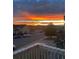 Scenic view from the property showcasing a vibrant sunrise over a peaceful neighborhood at 2673 Live Oak Ct, Castle Rock, CO 80104