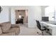 Bright office with desk, couch, chair and storage, creating a functional workspace at 2673 Live Oak Ct, Castle Rock, CO 80104