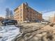 Brick apartment building with on-site parking and classic architecture, offering convenience and a sense of community at 1366 Garfield St # 209, Denver, CO 80206