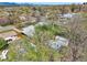 Aerial view of the property with lush, mature trees offering shade and privacy in this quiet neighborhood at 7780 Osceola St, Westminster, CO 80030