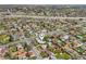 An aerial view showcasing the neighborhood with tree-lined streets and a convenient location near the highway at 7780 Osceola St, Westminster, CO 80030