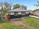Charming single-story home boasts a well-maintained front yard, fresh exterior paint, and lovely curb appeal at 7780 Osceola St, Westminster, CO 80030