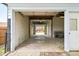Spacious garage with open door, concrete floor and block walls at 7780 Osceola St, Westminster, CO 80030